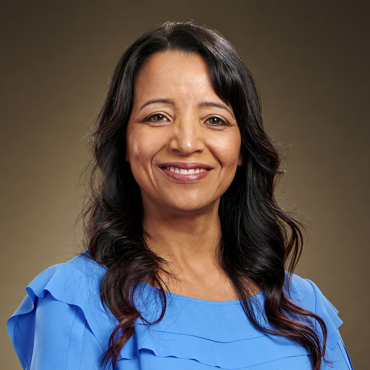 Portrait of Lourdes Gonzalez, Systems & Process Director